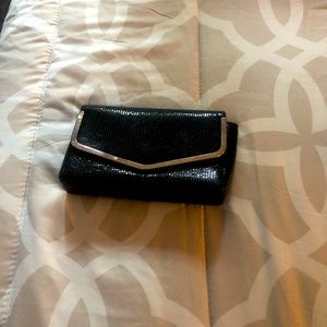 Black clutch used a couple time to go to wedding